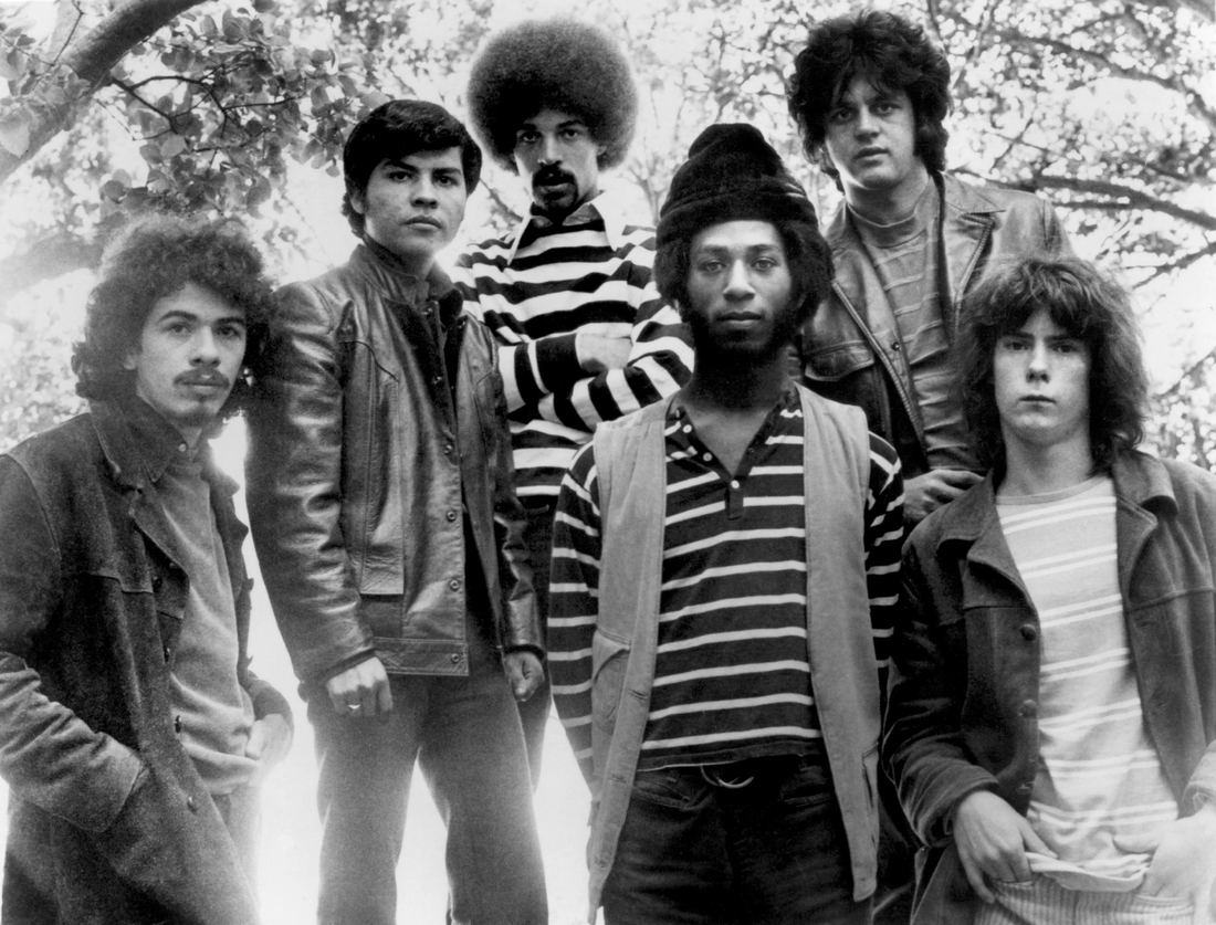 Black and white 1969 press photo of the six members of the band Santana